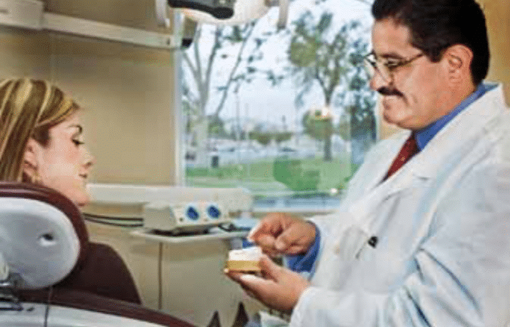 Dr. Burquez reviewing a treatment plan with a patient
